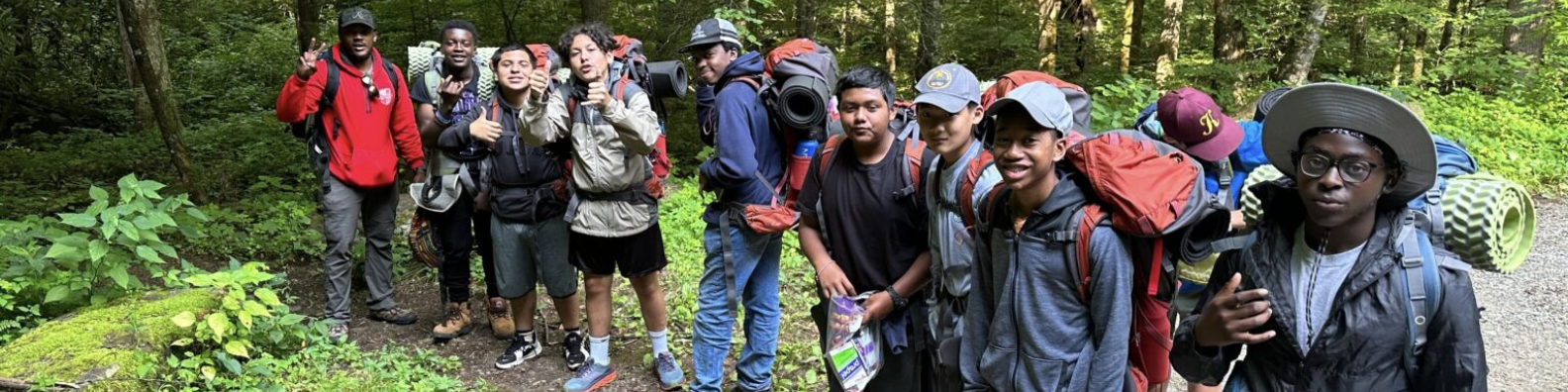 Youth Leaders in a group on a trail